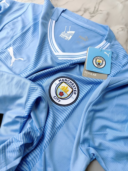 Venu Manchester City home football jersey